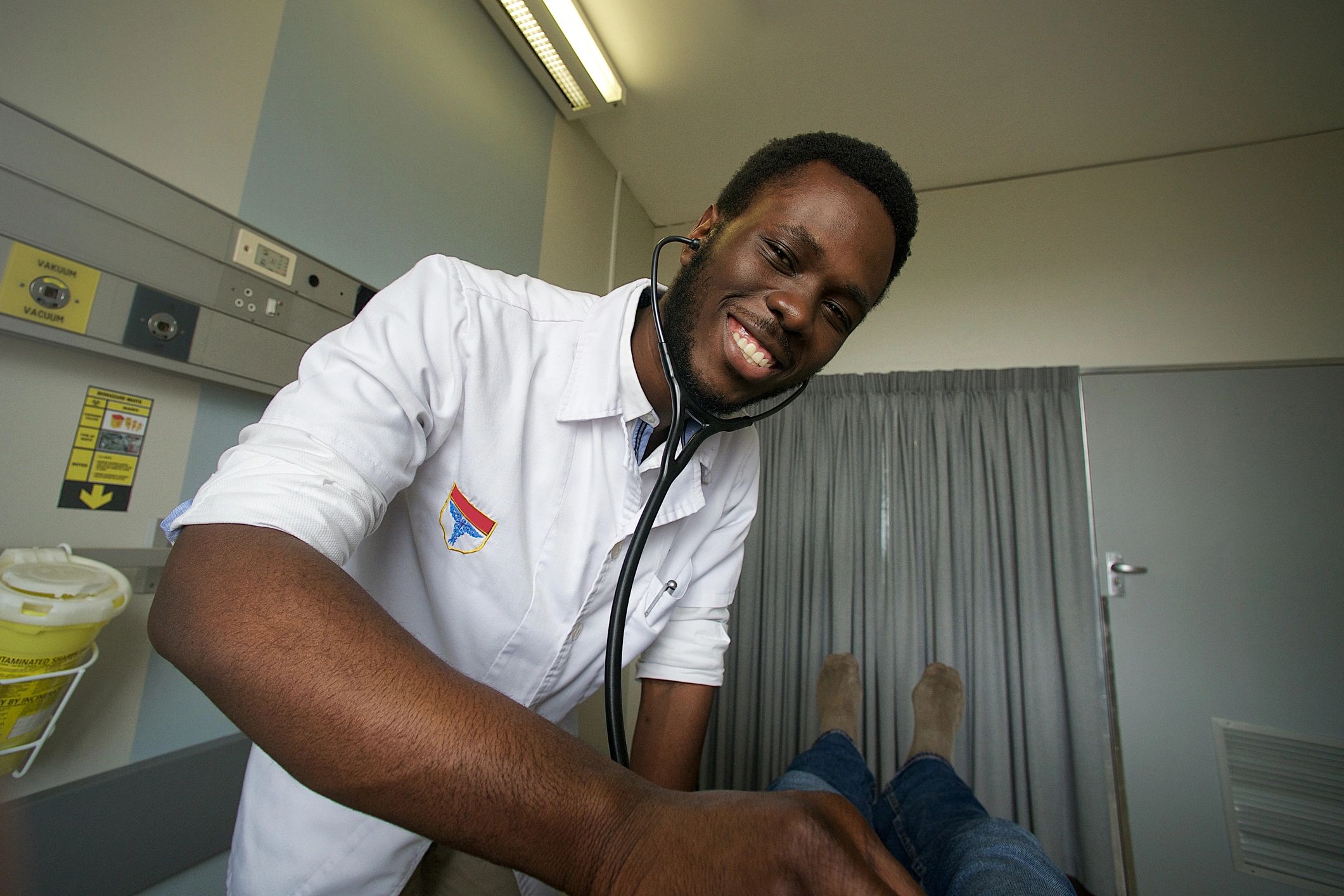 Student clinician providing care during a campus clinic visit