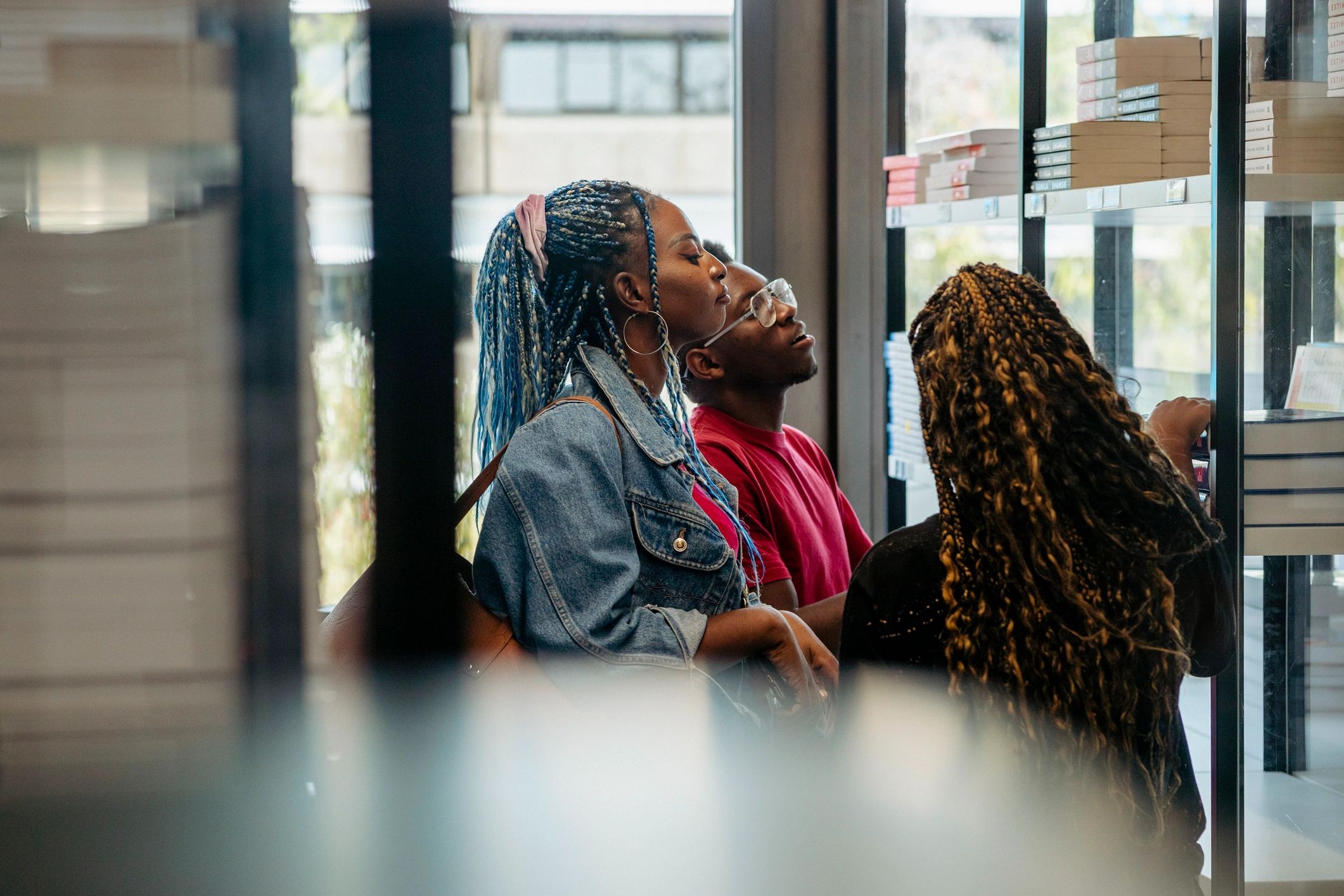 Students researching together in a university library