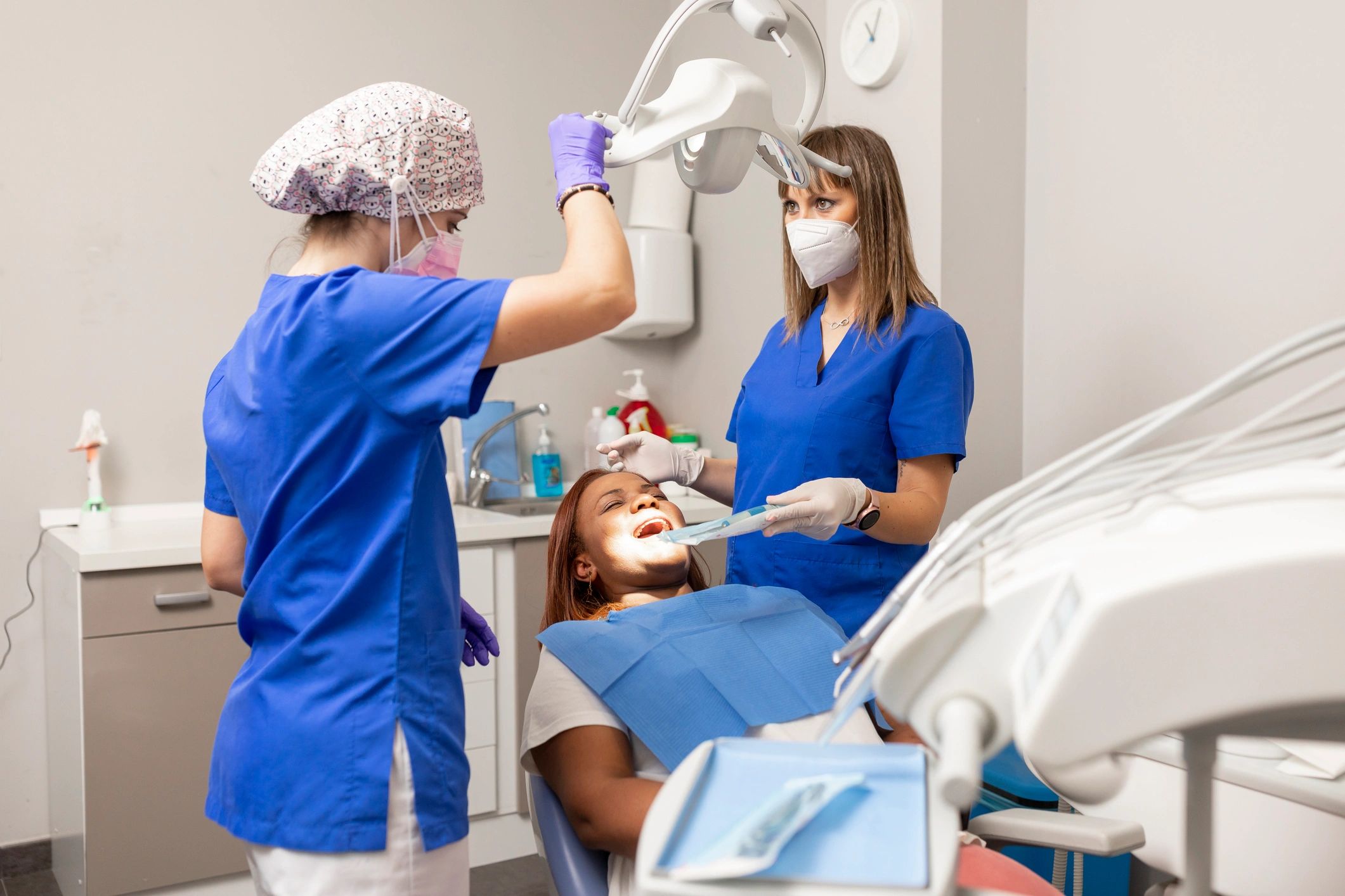 Dental clinician preparing a treatment room