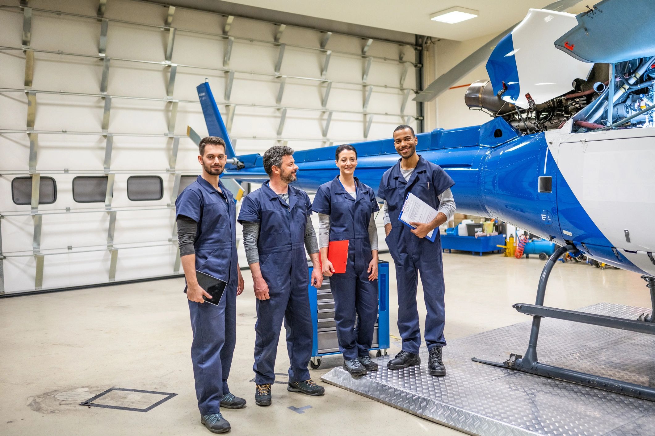 Technical operations team working near vehicles