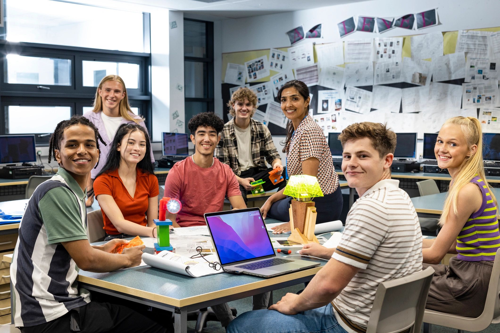 Students collaborating in a technology classroom