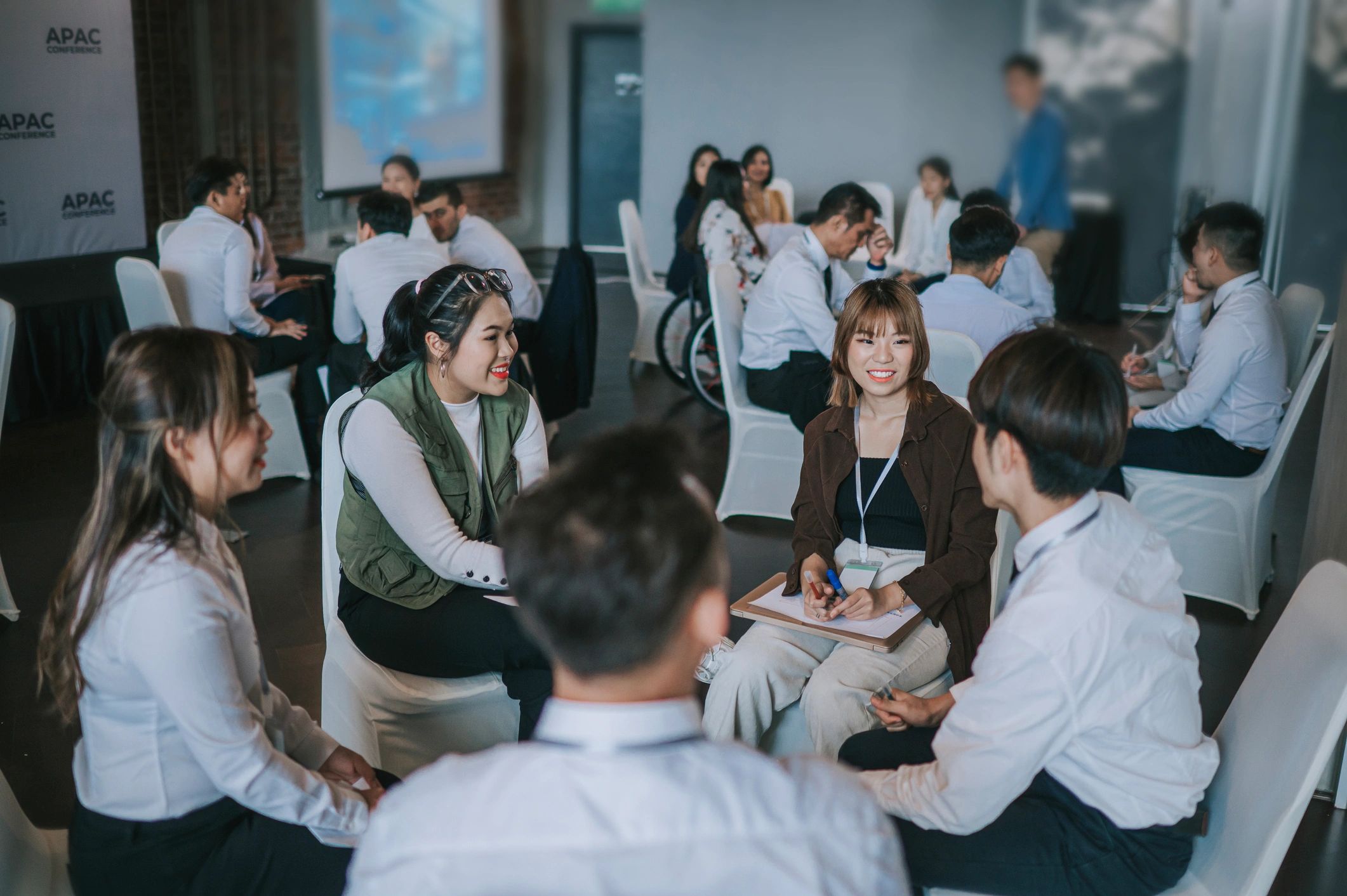 Students collaborating during a business workshop