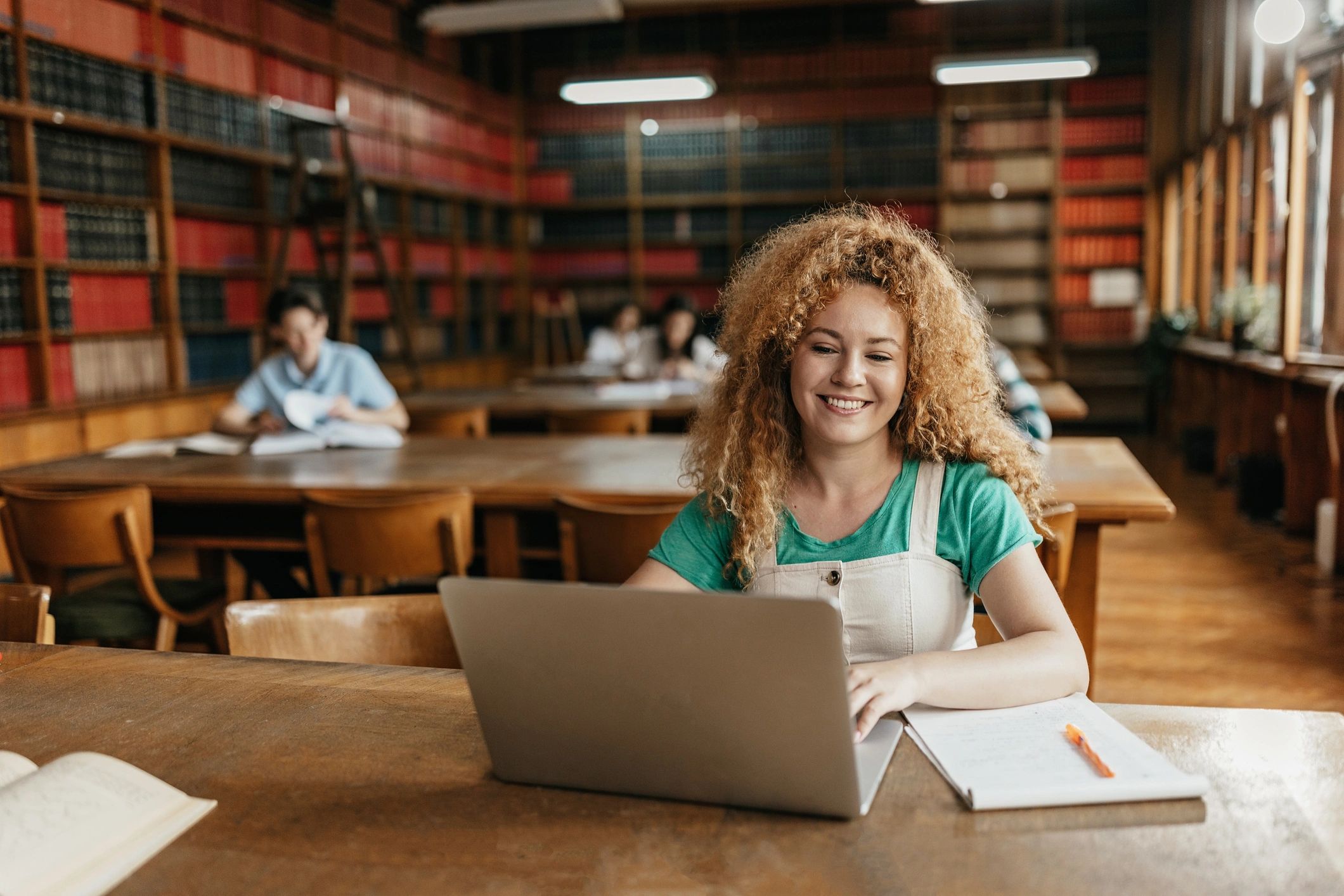 University student reviewing academic records on a laptop