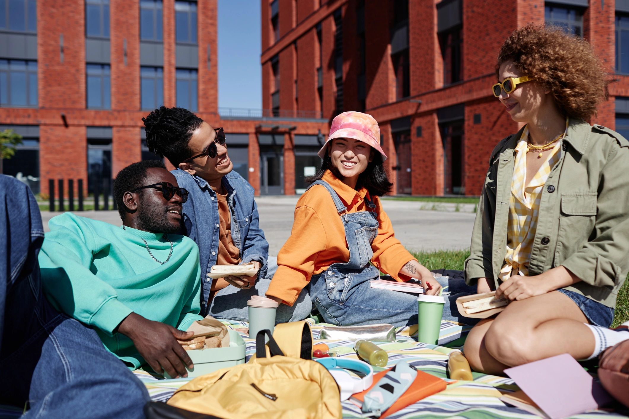 Diverse students enjoying fellowship outdoors on campus