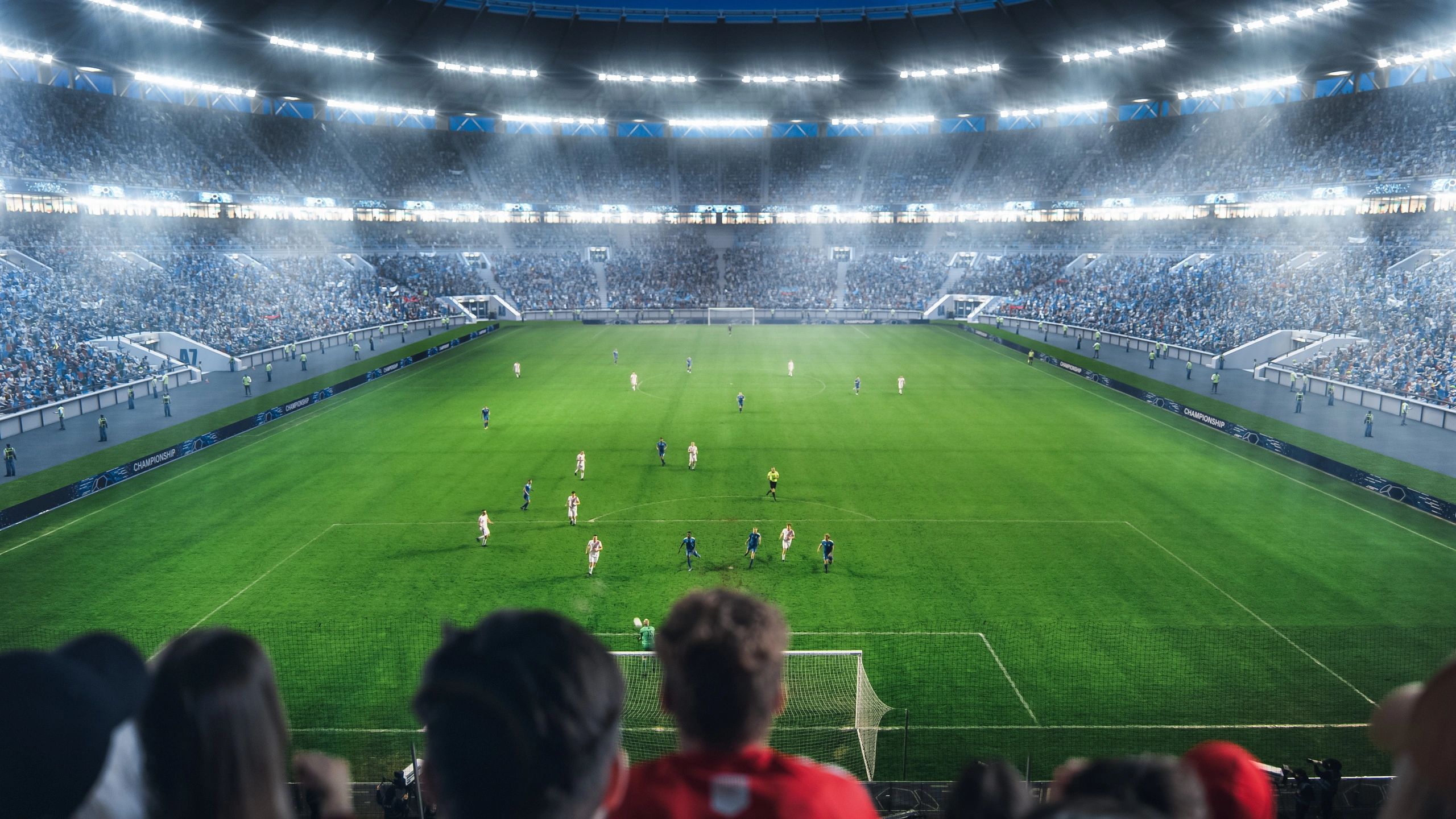 Fans cheering in a packed stadium during a football match