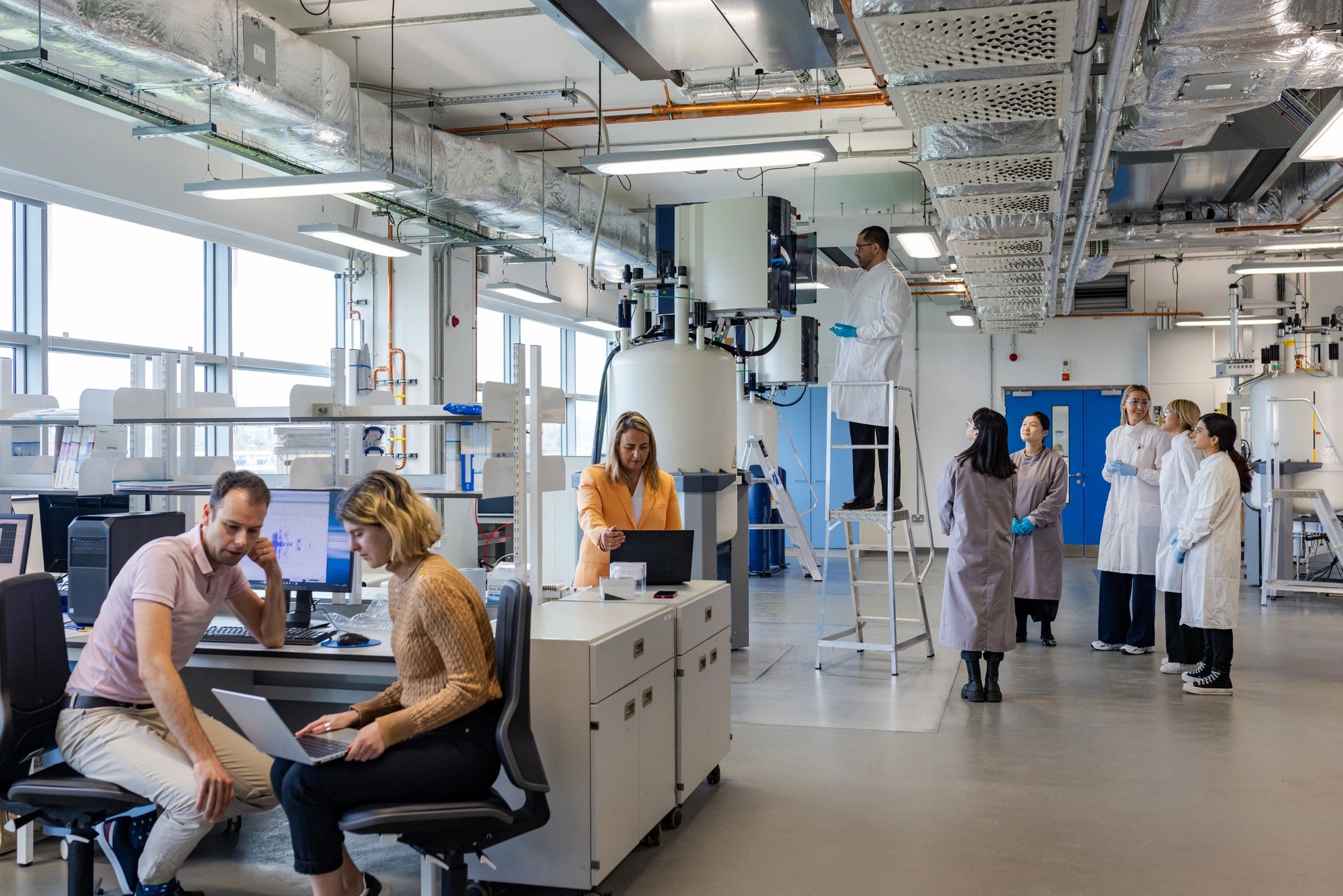 Researchers working together in a university laboratory