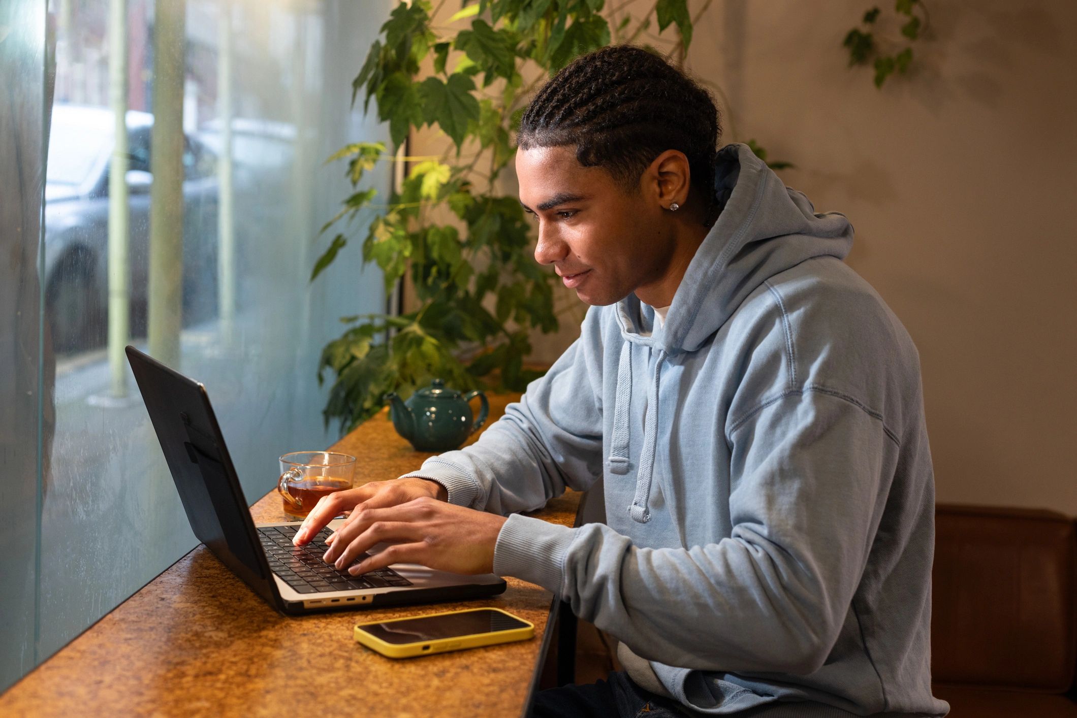 College student working on a laptop