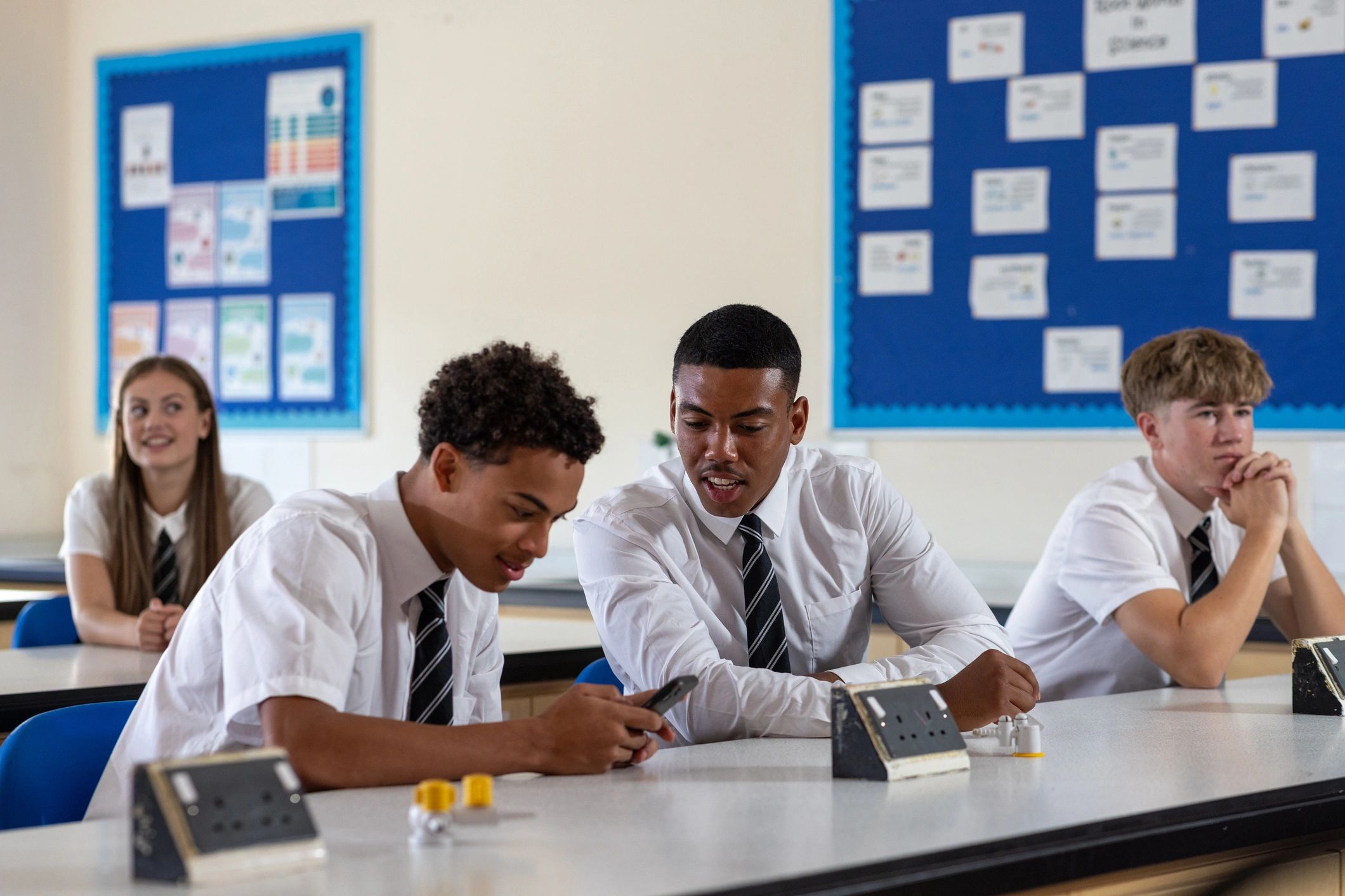 Students participating in a science classroom lab