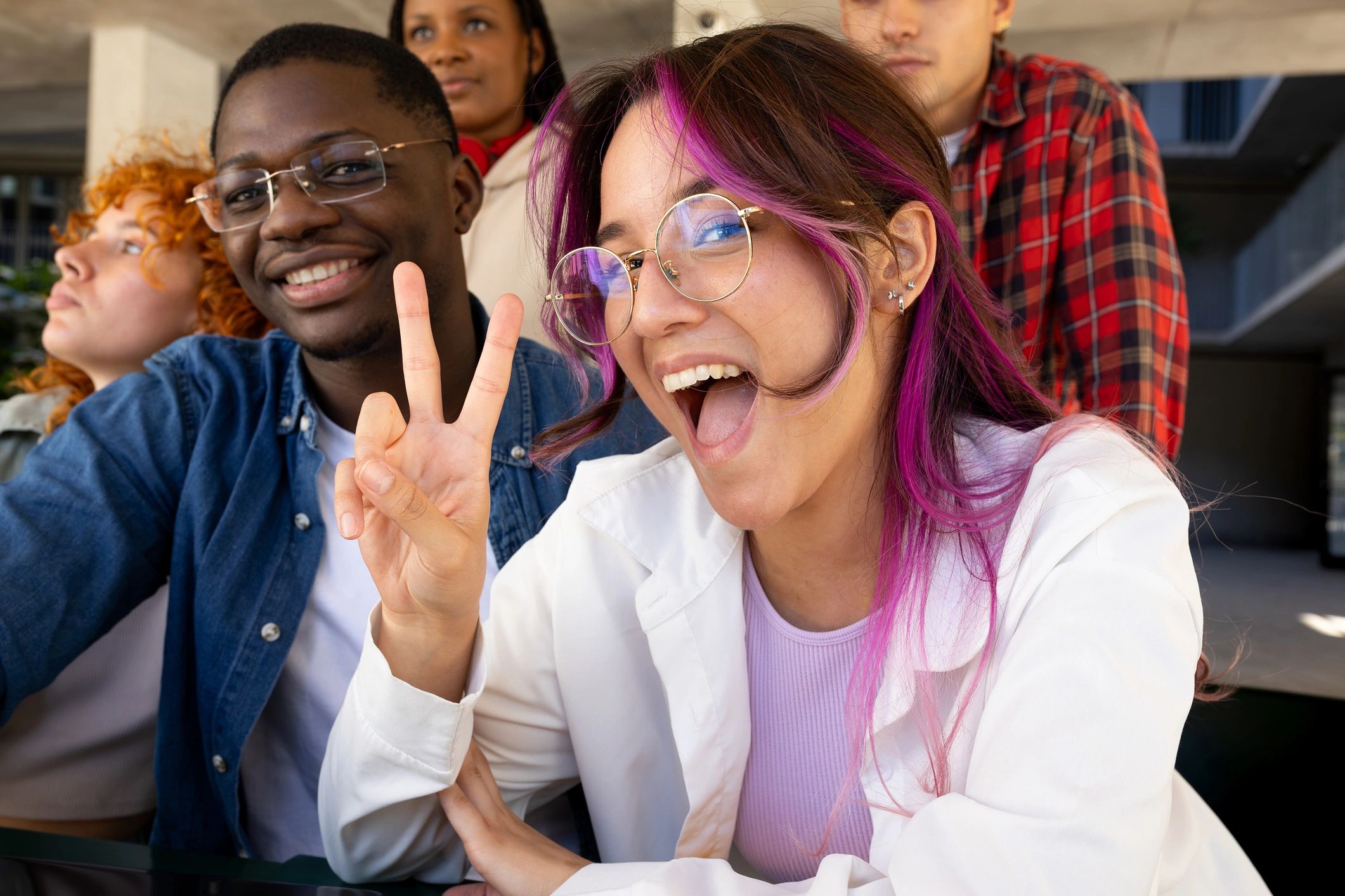 Happy diverse students smiling together