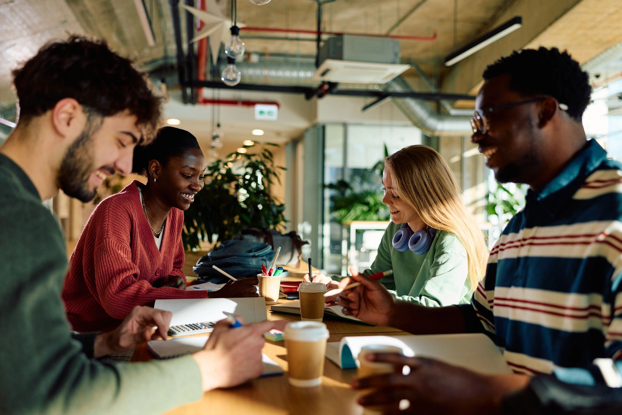 Diverse university students collaborating in a welcoming campus space