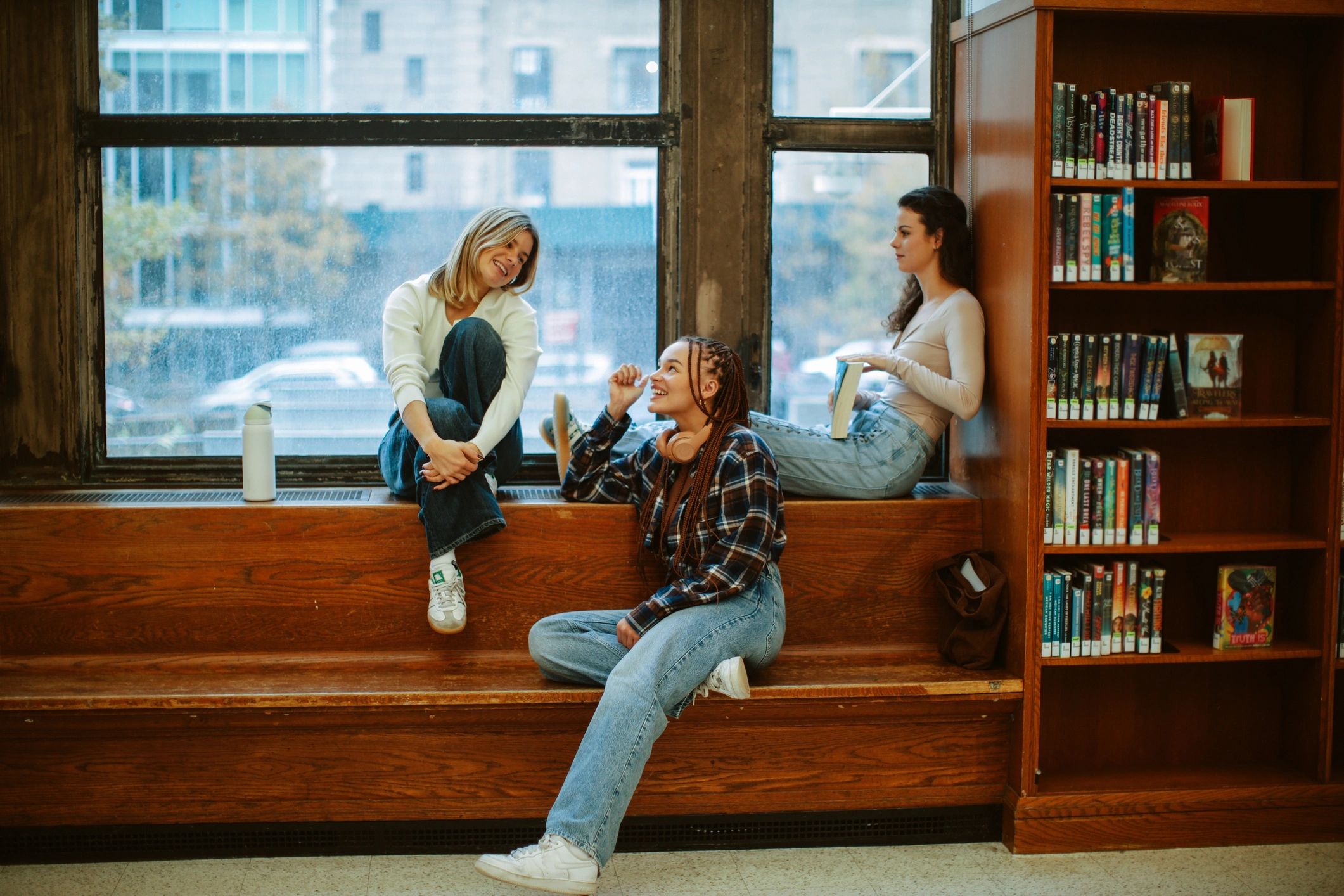 University students studying together in a library
