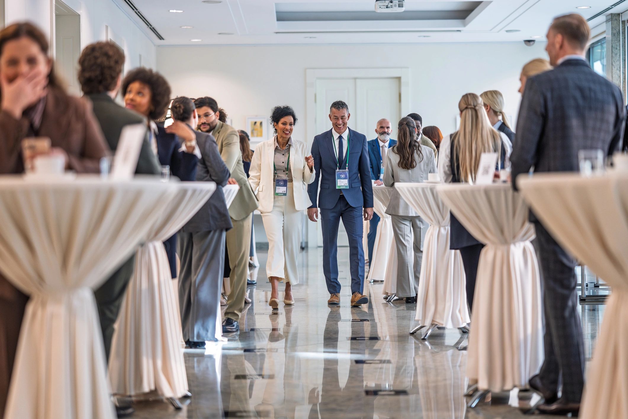 Alumni networking at a professional event