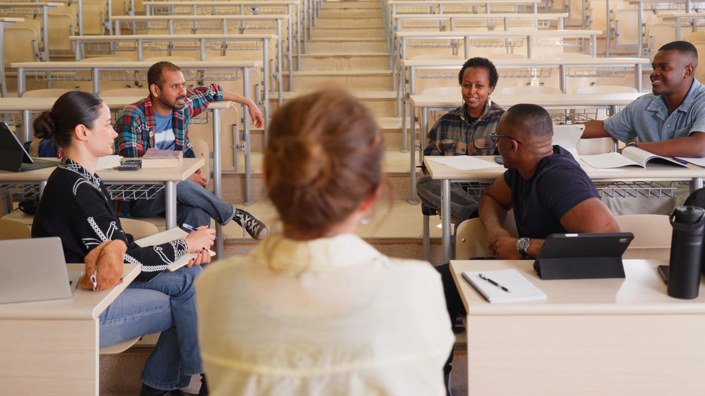 University students collaborating in a classroom