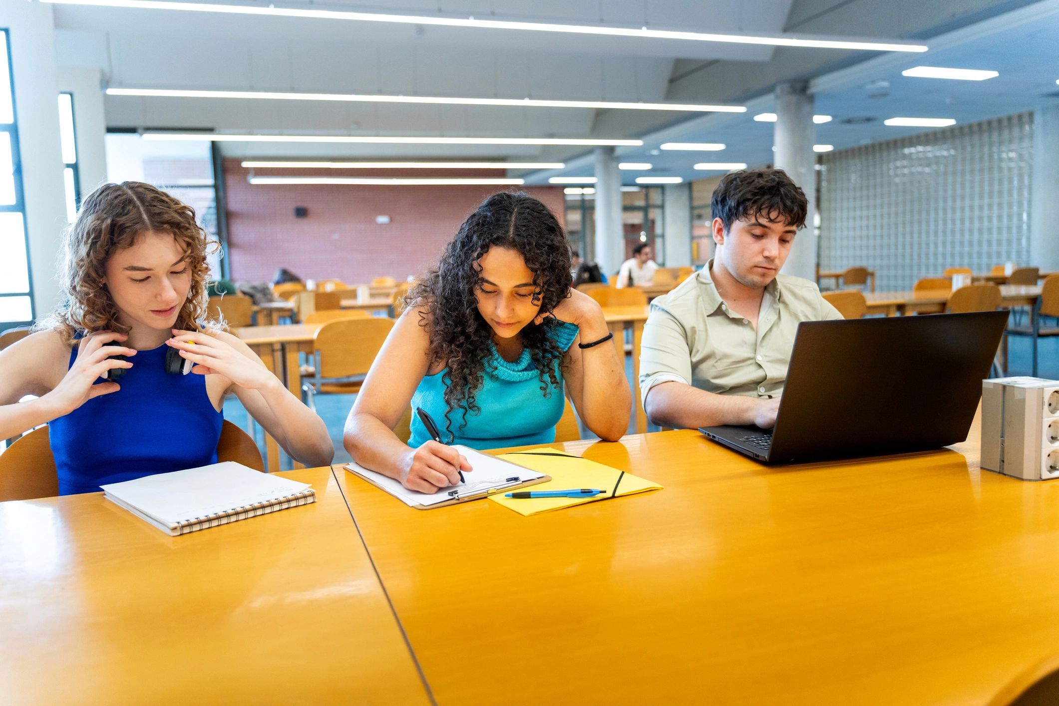 Students studying together in the university library
