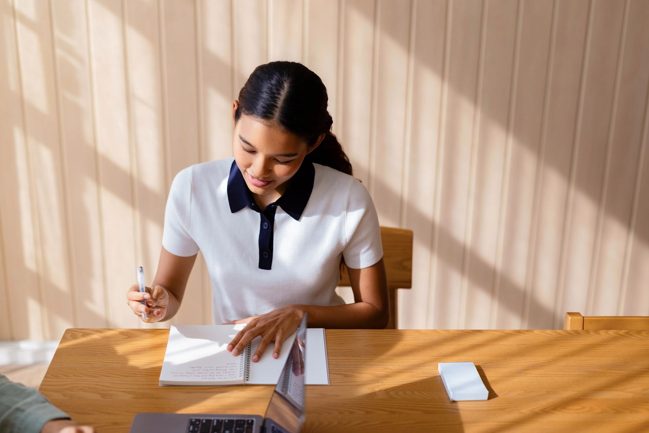 College student preparing for an assessment at a desk